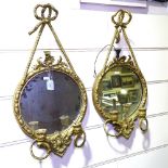 A pair of Victorian gilt-gesso framed wall mirrors, with twin candle brackets, overall height 2'2"