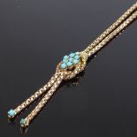 An unmarked gold turquoise knot and double-tassel necklace, with popcorn link chain, necklace length