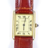 CARTIER - a lady's silver-gilt Vermeil Tank quartz wristwatch, champagne dial with Roman numeral