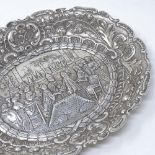 A Portuguese? oval silver commemorative dish, with central relief embossed Royal marriage scene