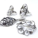 2 Danish silver rings, and 2 silver stylised openwork brooches (4)