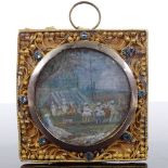 A 19th century Indian miniature watercolour depicting an encampment, in ornate jewel set gilt-