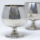 A pair of 1970s silver brandy goblets, of plain form with gilt interior, by A T Cannon Ltd,