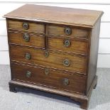An unusual early 19th century mahogany chest of drawers of small size, with 4 short and 2 long