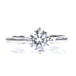 A platinum 0.71ct solitaire diamond ring, diamond measures: diameter - 5.86mm, depth - 3.46mm,
