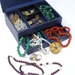 A box of various jewellery, including gold brooches, agate beads etc