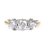 An 18ct gold 3-stone diamond ring, total diamond content approx 0.9ct, setting height 5.4mm, size L,