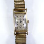 BUTEX - an Art Deco 14ct gold mechanical wristwatch, silvered dial with Arabic numerals and