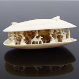 A Chinese carved ivory clam shell circa 1900, length 7cm