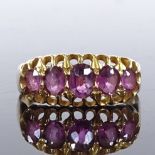 An 18ct gold 5-stone graduated amethyst half-hoop ring, setting height 7.1mm, size L, 2.3g