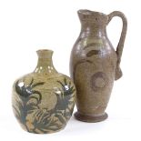 2 pieces of British Studio pottery, comprising a tall jug signed J Divine 1938, height 26cm, and a