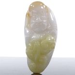 A Chinese relief carved jade reclining figure, length 8cm