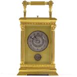 A 19th century French brass-cased carriage clock with Corinthian columns, silvered dials and