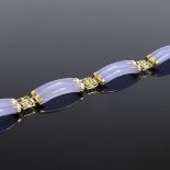 An Oriental 14ct gold double lavender jade panel bracelet, with character mark spacers, bracelet