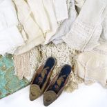 A collection of Victorian lace dress ornaments, christening gowns, a lace-trimmed bodice etc