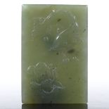 A Chinese relief carved jade plaque, length 7cm