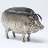 An Edwardian novelty silver pig pin cushion, by Abrahall & Bint, hallmarks Birmingham 1905, length