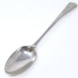 A George III Irish silver gravy spoon, with bright-cut engraved handle, by Joseph Cullen,