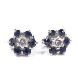 A pair of 18ct white gold sapphire and diamond cluster flowerhead earrings, with stud fitting,