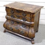 An Antique Dutch burr-walnut bombe chest of 4 long drawers, quarter veneered top with scalloped edge