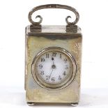 A late Victorian silver-cased carriage clock with enamel dial, Goldsmiths & Silversmiths Co