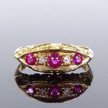 An 18ct gold 5-stone ruby and diamond half-hoop ring, with scroll engraved bridge, maker's marks W