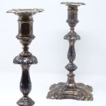 A pair of silver candlesticks, by Harrods Ltd, hallmarks Sheffield 1958, height 23cm, loaded bases