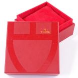 A red Tudor wristwatch box, no. 91.00.08
