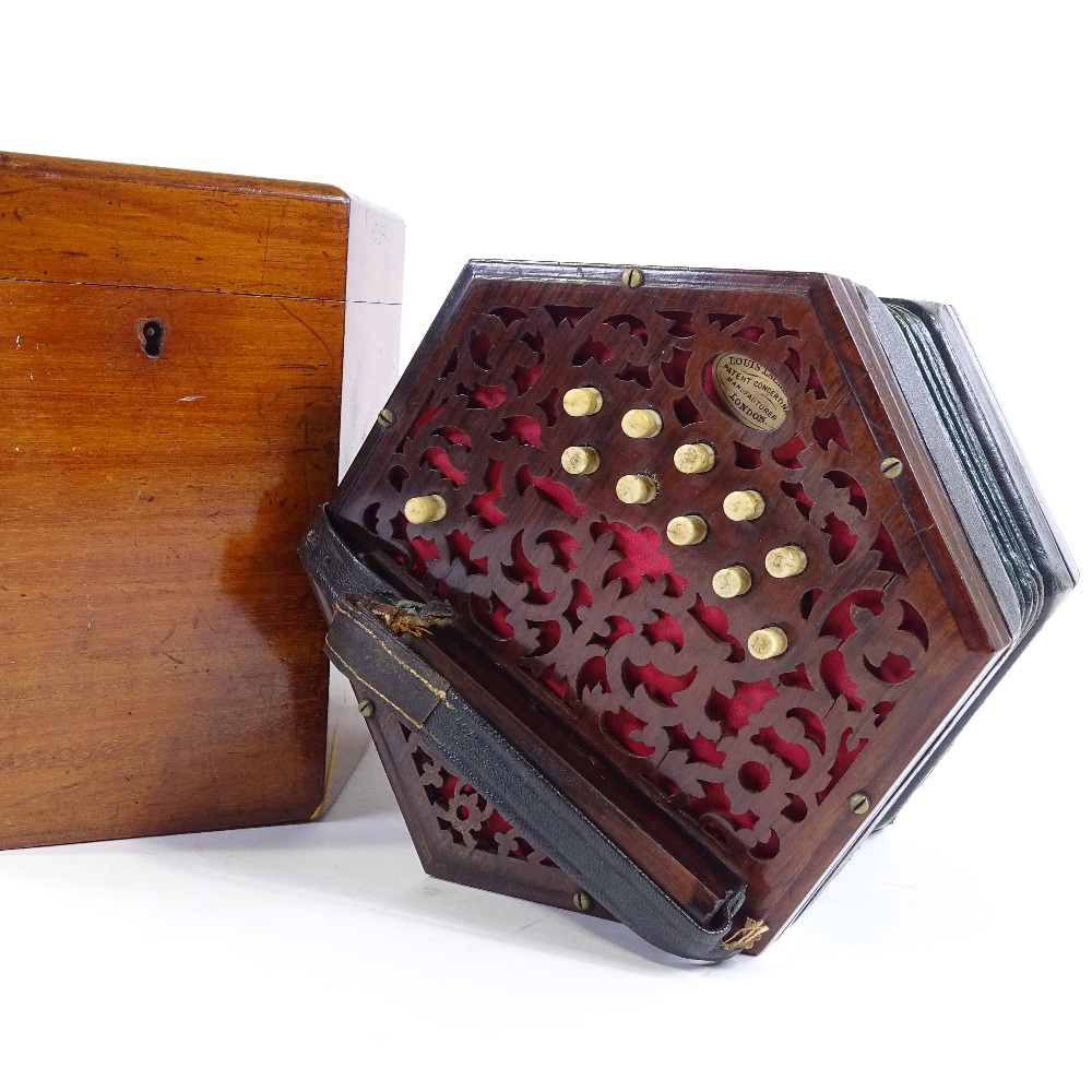 A Louis Lachenal patent concertina in original walnut case
