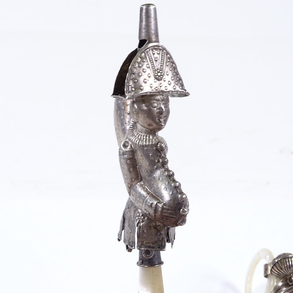 A silver and mother-of-pearl baby's rattle, and an 18th century French rattle/whistle in the form of - Image 3 of 3