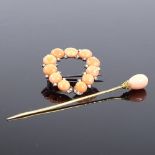 A Victorian unmarked gold coral and split-pearl horseshoe brooch, length 34.4mm, together with an