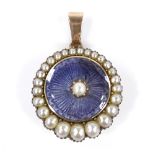 An unmarked gold graduated split-pearl and purple enamel circular memorial pendant, with vacant