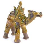 A Turkish Canakkale yellow glaze pottery camel and rider, height 19cm