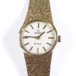 OMEGA - a lady's 9ct gold De Ville mechanical cocktail wristwatch, silvered dial with baton hour