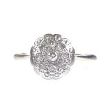 An 18ct gold diamond cluster flowerhead ring, setting height 9.7mm, size L, 2.1g