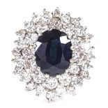 An 18ct gold sapphire and diamond cluster cocktail ring, total diamond content approx 2ct, setting
