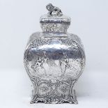 A 19th century French silver tea caddy, of rectangular baluster form, with relief embossed lover