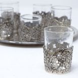 A German silver drinking tot set, comprising 6 silver-mounted glass tots and circular silver tray,