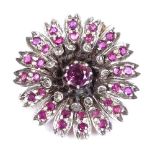 A Victorian unmarked gold ruby and diamond cluster flowerhead brooch, brooch diameter 26.2mm, 8.7g