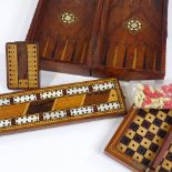 A group of Victorian games boxes and cribbage markers