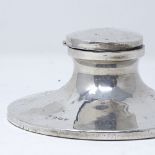 A George V silver capstan inkwell, with glass liner, by William Neale & Sons Ltd, hallmarks