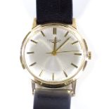 LONGINES - a 9ct gold mechanical wristwatch, silvered dial with baton hour markers and original