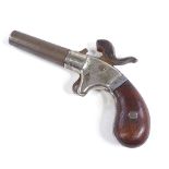 A small Antique percussion pocket pistol, length 13cm
