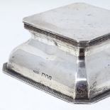 A late Victorian square silver inkwell, with glass liner, by John Grinsell & Sons, hallmarks