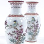 A pair of Chinese Republic porcelain vases, hand painted birds and blossom, height 21cm