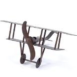 A First War Period trench art bi-plane, inscribed Dixmude, wingspan 16cm