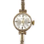 ROTARY - a lady's 9ct gold mechanical wristwatch, silvered dial with baton hour markers, 21 jewel