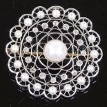 A Belle Epoque Mabe pearl and diamond circular target brooch, with central pierced sun design pearl,
