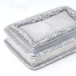 A William IV rectangular silver snuffbox, with relief embossed floral decoration and engine turned