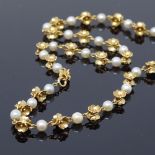 An unmarked gold cultured pearl and floral panel necklace, necklace length 40cm, 15.9g